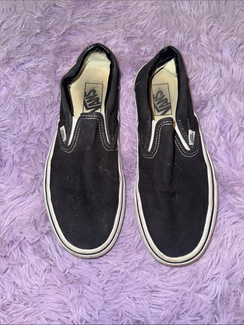 Vans Black and White Classic Slip-On Sneakers
